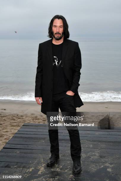 Keanu Reeves attends the Saint Laurent Mens Spring Summer 20 Show on June 06, 2019 in Paradise Cove Malibu, California.