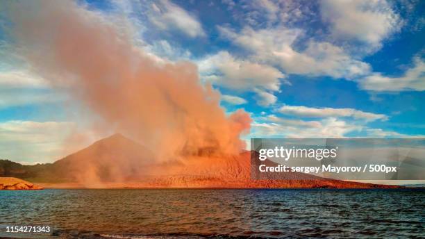 eruption of tavurvur volcano, rabaul, new britain island, png - rabaul stock pictures, royalty-free photos & images