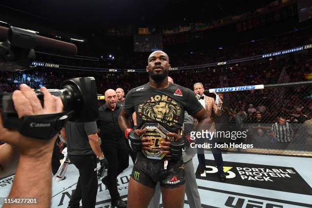Jon Jones looks on following his win iver Thiago Santos of Brazil in their UFC light heavyweight championship fight during the UFC 239 event at...