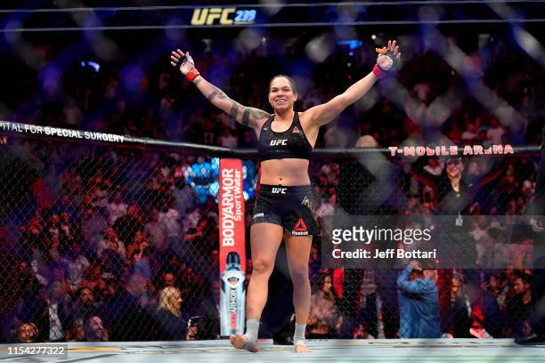 Amanda Nunes of Brazil celebrates after defeating Holly Holm in their UFC bantamweight championship fight during the UFC 239 event at T-Mobile Arena...