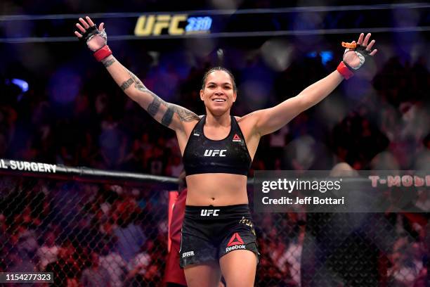 Amanda Nunes of Brazil celebrates after defeating Holly Holm in their UFC bantamweight championship fight during the UFC 239 event at T-Mobile Arena...