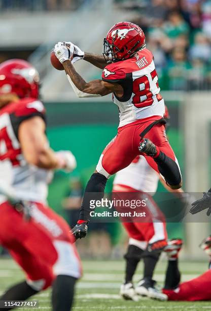 Josh Huff of the Calgary Stampeders makes a tough leaping catch in the game between the Calgary Stampeders and Saskatchewan Roughriders at Mosaic...