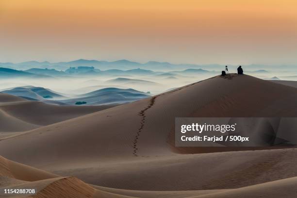 stillness - abu dhabi sunrise stock pictures, royalty-free photos & images