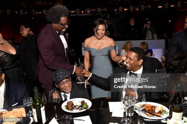 Kamau Bell, Spike Lee, and Denzel Washington attend the 47th AFI Life Achievement Award honoring Denzel Washington at Dolby Theatre on June 06, 2019...