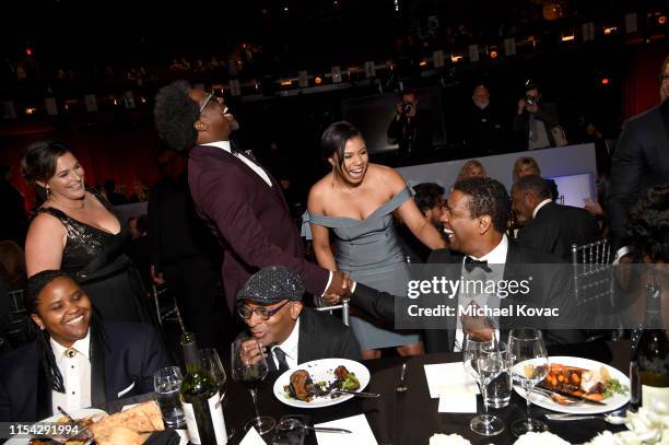 Kamau Bell, Spike Lee, and Denzel Washington attend the 47th AFI Life Achievement Award honoring Denzel Washington at Dolby Theatre on June 06, 2019...