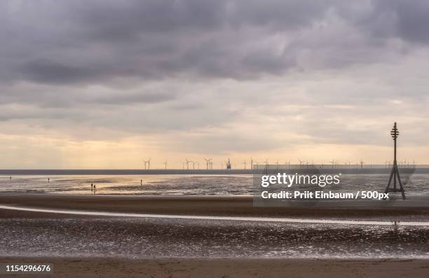 under cloudy skies (1) - crosby imagens e fotografias de stock