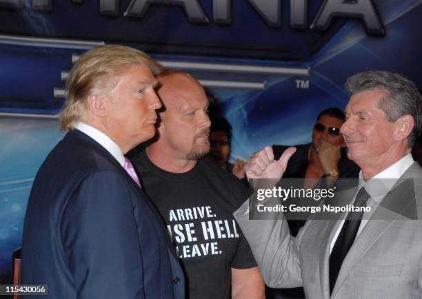 Donald Trump, Steve Austin and Vince McMahon during Donald Trump and WWE News Conference for WrestleMania 23 at Trump Tower in New York City, New...