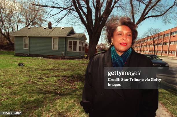 Delores Grigsby and Cecil Adair reminisce about their north Minneapolis neighborhood. -- Delores Grigsby stands in front of the house her great...