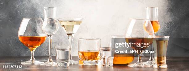 set of hard strong alcoholic drinks and spirits in glasses in as - pisco peru stock pictures, royalty-free photos & images