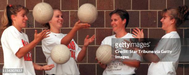 White Bear Lake - Friday, Sept. 17, 1999 - Rittenhouse family involved with volleyball -- Volley balls are just one of the elements juggled in the...