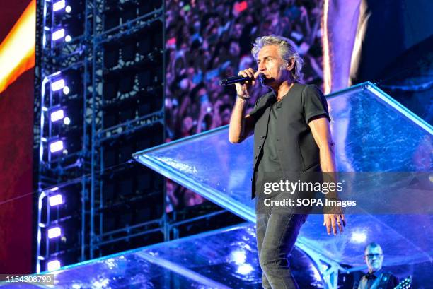 Luciano Ligabue performs live on stage during the music tour 2019 at the Stadio Olimpico Grande Torino in Turin.