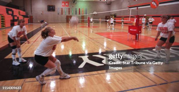 White Bear Lake - Friday, Sept. 17, 1999 - Rittenhouse family involved with volleyball -- Sarah Rittenhouse Kristin Rittenhouse, 16 and their sister...
