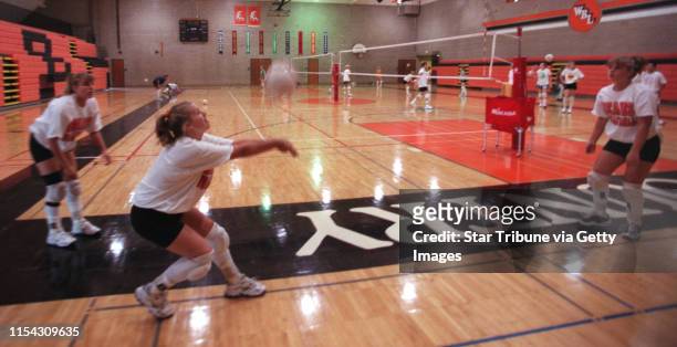 White Bear Lake - Friday, Sept. 17, 1999 - Rittenhouse family involved with volleyball -- Sarah Rittenhouse Kristin Rittenhouse, 16 and their sister...