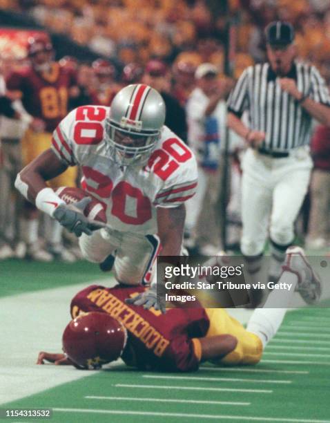 Minneapolis Mn, Uof M vs Ohio State 10/23/99----Ohio State cornerback Nate Clements is tackled by U of M quarterback Billy Cockerham after picking...