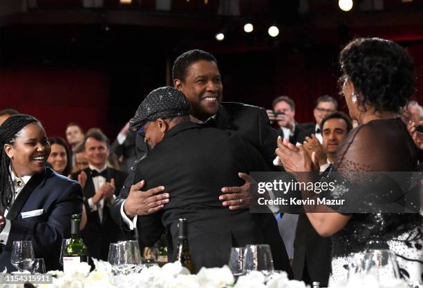 Katia Washington, Spike Lee, honoree Denzel Washington, and Pauletta Washington attend the 47th AFI Life Achievement Award honoring Denzel Washington...