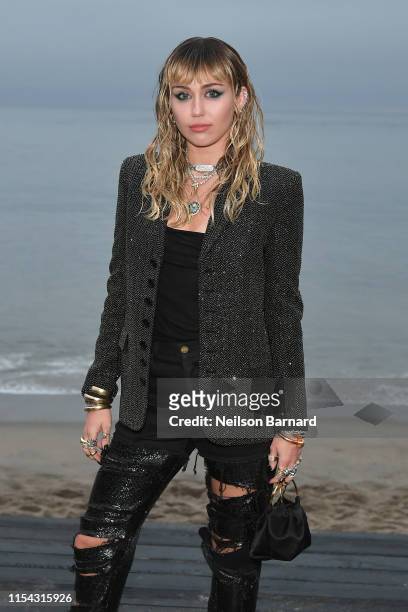 Miley Cyrus attends the Saint Laurent Mens Spring Summer 20 Show Photo Call on June 06, 2019 in Malibu, California.