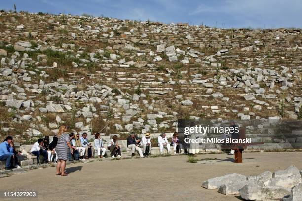 People attend the opening exhibition "Sight" by British sculptor Sir Antony Gormley Archaeological site and Museum of Delos curated...