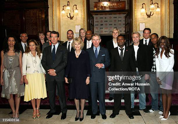 The Duchess of Cornwall and The Prince of Wales pose with Prince's Trust Ambassadors, as they arrive at the Theatre Royal Drury Lane in London to...