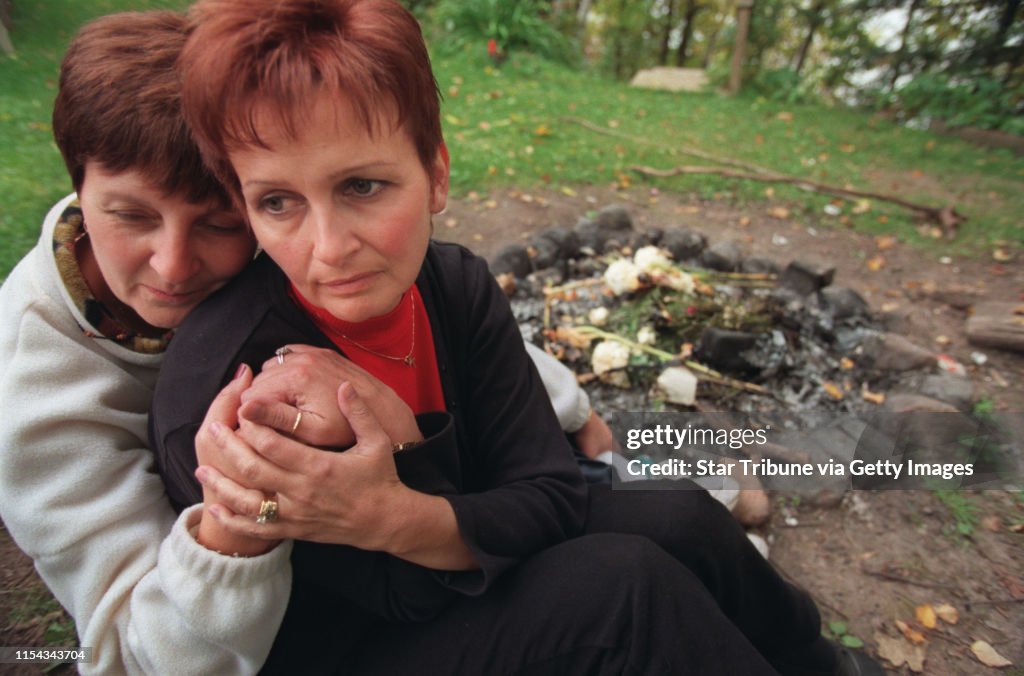 Moose Lake, MN. September 25, 1999. Interview with Pam Poirier, mother of murder victim Katie Poirier, and PamÕs sister Debbie Krampf. -- Pam Poirier, mother of murder victim Katie Poirier, sat with her sister Debbie Krampf by the family fire pit whe
