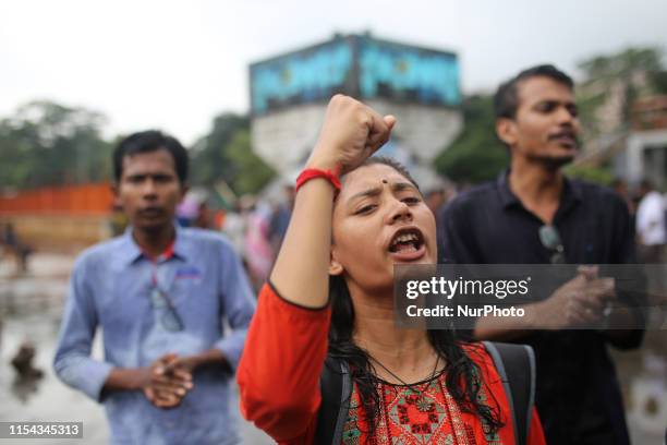 Supporters of Left Democratic Alliance shout slogans during a half-day strike across the country protesting the recent gas price hike in Dhaka,...