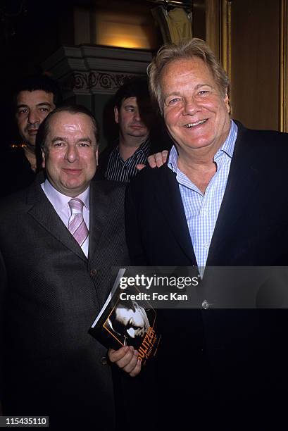 Paul Loup Sulitzer and Massimo Gargia during Massimo Gargia's Photographs Collection Exhibition - April 27, 2006 at Royal Monceau Hotel in Paris,...