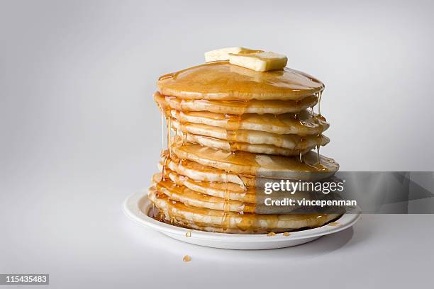 precarious stack of pancakes with syrup and butter - pancake 個照片及圖片檔