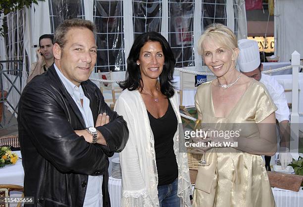 Henry Winterstern and wife with Trudie Styler during 2006 Cannes Film Festival - "A Guide To Recognizing Your Saints" Dinner in Cannes, France.