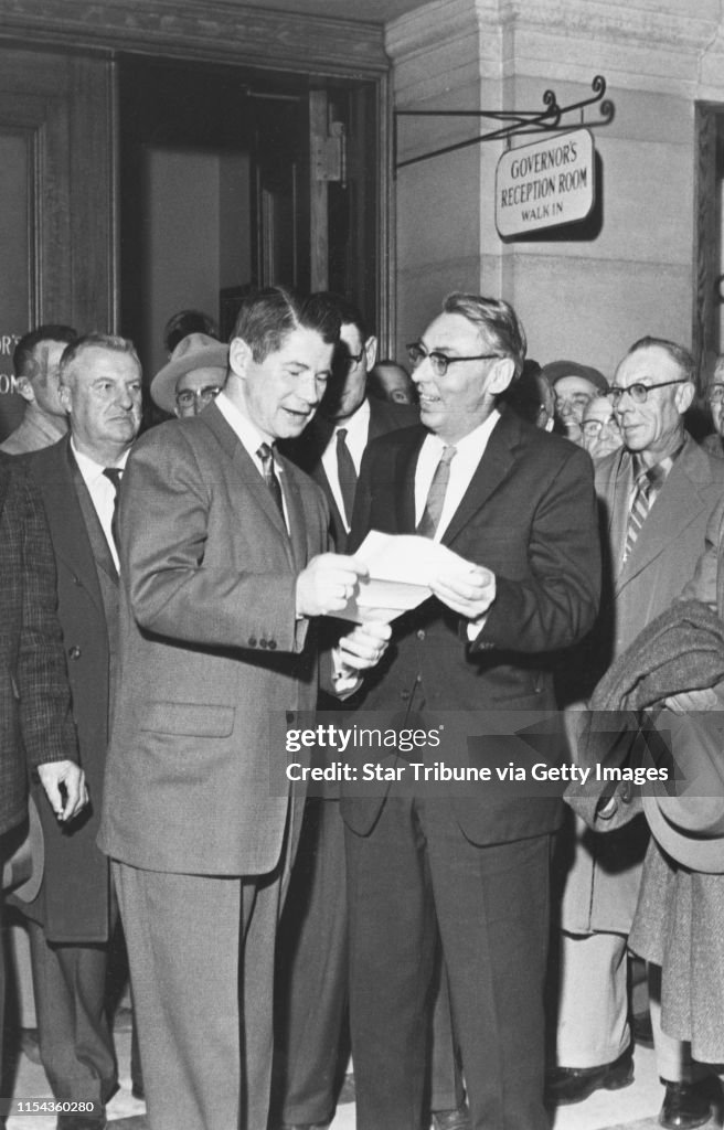 Albert Lea (Minn.) farmers saw Gov. Orville Freeman (center left). The farmers approved his closing the Wilson plant. See op-ed commentary article Wed Feb 26, 2003, Star Tribune, page A15, by Cheri Register. Minneapolis Tribune (now Star Tribune) photo, D