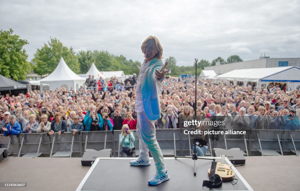 Jürgen Drews, pop singer, sings at the Red Roses Fan Day. At the ...
