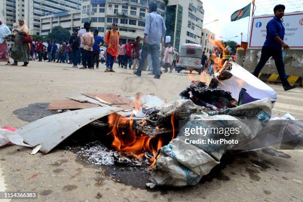 Activist of Left Democratic Alliance set fire as they block road during a half-day strike across the country protesting against natural gas price...