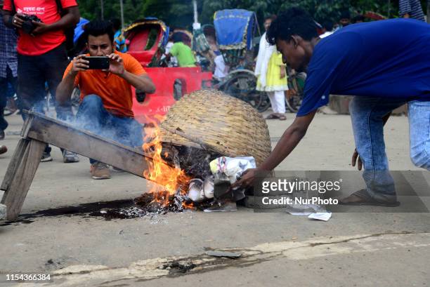 Activist of Left Democratic Alliance set fire as they block road during a half-day strike across the country protesting against natural gas price...