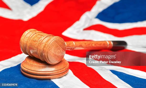 union jack flag with gavel - peter law foto e immagini stock