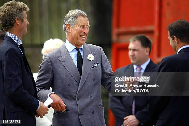 Prince Charles, the Prince of Wales, jokes during a visit to Fentongollan Farm near Truro on13 June, 2006. The farm produces 80% of all the green...