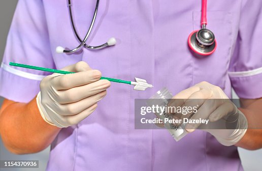 Nurse/doctor doing Smear Test Nurse/doctor doing Smear Test