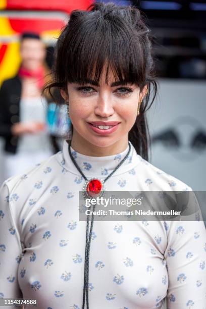 Singer Aura Dione arrives at Vienna Airport for the Life Ball event on June 07, 2019 in Vienna, Austria.