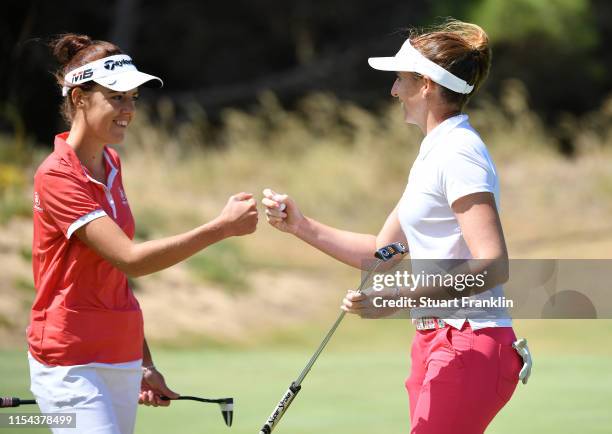 Meghan MacLaren and Florentyna Parker of England celebrate on the first hole during Day One of the GolfSixes at Oitavos Dunes on June 07, 2019 in...