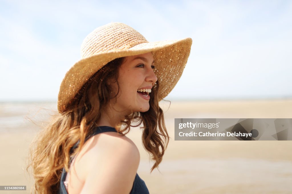 Portrait of a young woman on the beach