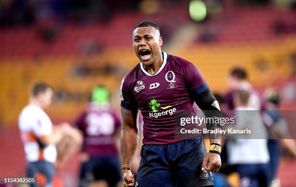 Samu Kerevi of the Reds celebrates victory after the round 17 Super Rugby match between the Reds and the Blues at Suncorp Stadium on June 07, 2019 in...