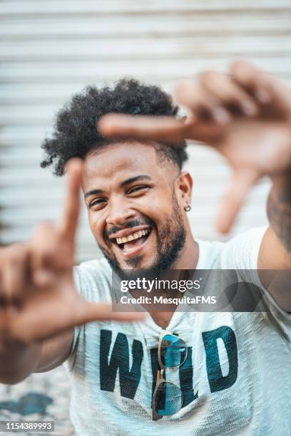 young man gesturing - emo guy stock pictures, royalty-free photos & images