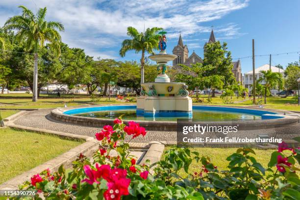 view of independence square and immaculate conception catholic co-cathedral, basseterre, st. kitts and nevis, west indies, caribbean, central america - saint kitts stockfoto's en -beelden