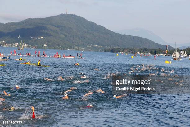 Athletes compete in the swim section at Ironman Austria on July 7, 2019 in Klagenfurt, Austria.