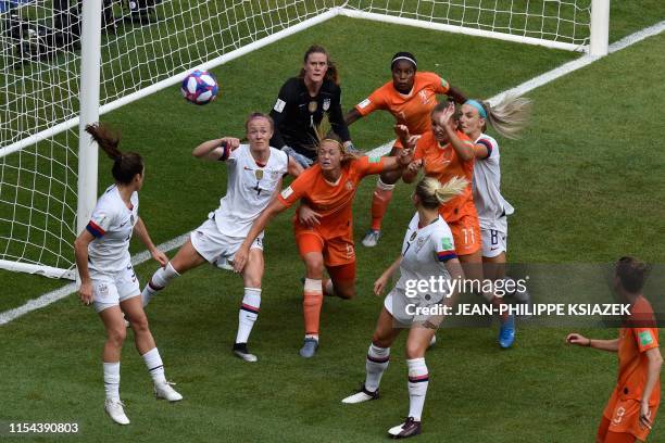 Players scramble in the goal mouth during the France 2019 Womens World Cup football final match between USA and the Netherlands, on July 7 at the...