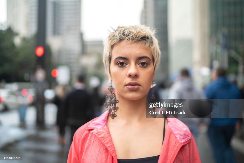 Portrait of a young latin woman in the city