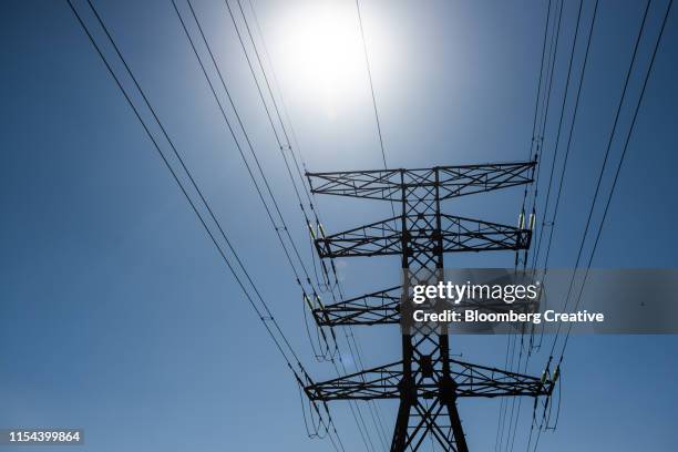 power lines on an electricity pylon - no electricity stock pictures, royalty-free photos & images