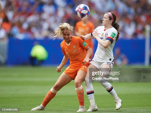 Jackie Groenen of Netherlands and Rose Lavelle of United States competes for the ball during the 2019 FIFA Women's World Cup France Final match...