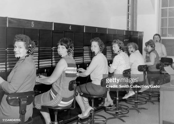 Telephone operators at six-position telephone board, Camp McCoy, Wisconsin, Dotti Kling, Alyce Wahl, Lorayne Denter, Doris Gallup, Eleanor Wiggins,...