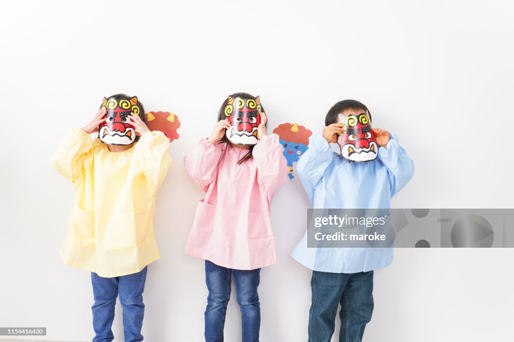 Children wear a Japanese Traditional mask