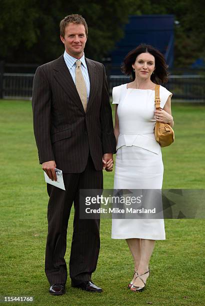 Rupert Penry Jones and Dervla Kirwan attends the Cartier International Polo Day at Guards Polo Club on July 26, 2009 in Egham, England.