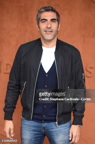 Ary Abittan attends the 2019 French Tennis Open - Day Thirteen at Roland Garros on June 07, 2019 in Paris, France.