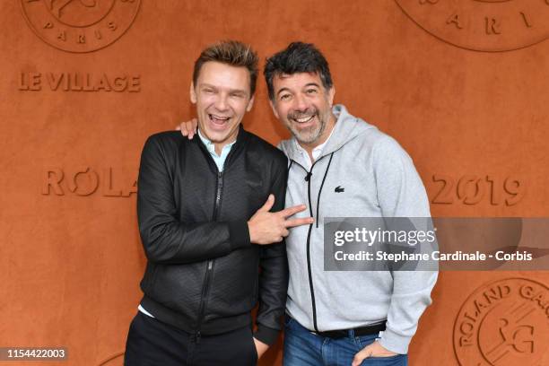 Stephane Plaza and Jean-Philippe Janssens, aka Jeanfi Janssens attend the 2019 French Tennis Open - Day Thirteen at Roland Garros on June 07, 2019 in...